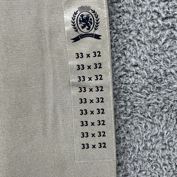 Tommy Hilfiger Traveler Khakis Pants Beige Pleated Mens Size 33x32 NEW With Tags - Picture 2 of 5